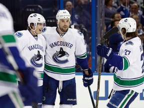 Vancouver Canucks defenceman Erik Gudbranson celebrates his goal against the Tampa Bay Lightning during an NHL game on Dec. 8, 2016, in Tampa, Fla. (AP Photo/Chris O'Meara)