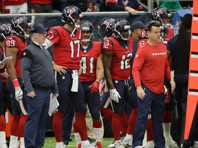 Houston Texans quarterback Brock Osweiler stands on the sideline after being benched during an NFL game against the Jacksonville Jaguars in Houston on Dec. 18, 2016. (AP Photo/David J. Phillip)