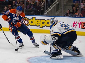 Leon Draisaitl takes the puck in on Blues goalie Jake Allen during a game in October at Rogers Place. (Greg Southam)