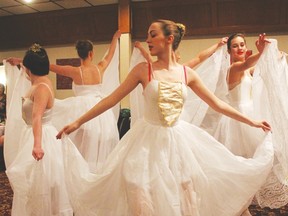 Ballet dancers from Gacelas School of Ballet entertain guests at the multicultural Christmas party.