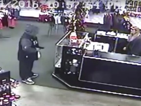 Surveillance video shows the moment a would-be robber busted into Lotions and Lace.
