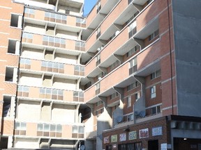 Toronto Police at the scene at 2067 Islington Ave. in Toronto after a man was found dead in an apartment Monday, Dec. 19, 2016. (Chris Doucette/Toronto Sun)