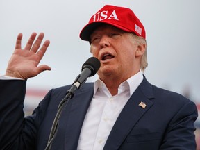 In this Saturday, Dec. 17, 2016 file photo, U.S. President-elect Donald Trump speaks during a rally at Ladd-Peebles Stadium in Mobile, Ala.