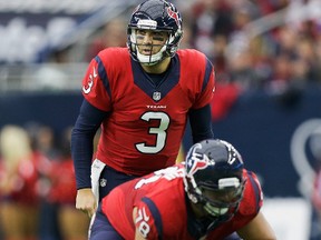 Tom Savage of the Houston Texans calls out a play at the line against the Jacksonville Jaguars at NRG Stadium on Dec. 18, 2016. (Bob Levey/Getty Images)