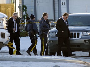 Police are investigating the scene at a home on Haney Court in Spruce Grove, Alberta on December 19, 2016 where the bodies of three people were discovered. Larry Wong/Postmedia