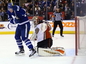 Frederik Gauthier dodges a point shot of the Toronto Maple Leafs in front of John Gibson of the Anaheim Ducks at the Air Canada Centre in Toronto on Dec. 19, 2016. (Dave Abel/Toronto Sun/Postmedia Network)