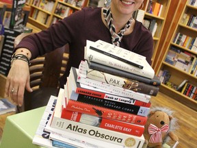 Susan Chamberlain, of Sarnia's The Book Keeper, shows off her Christmas reading picks at her Exmouth Street bookstore. Her eclectic list of recommendations includes Madeline Thien's Do Not Say We Have Nothing -- this year's Giller-Prize winning novel -- through to Atlas Obscura: An Explorer's Guide to the World's Hidden Wonders. Barbara Simpson/Sarnia Observer/Postmedia Network