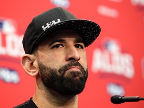 In this Oct. 5, 2016, file photo, Toronto Blue Jays right fielder Jose Bautista answers a question during a news conference in Arlington, Texas. (AP Photo/David J. Phillip, File)