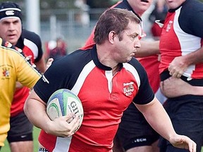 Steve Alexander lugs the ball for the Belleville Bulldogs Old Boys in a contest vs. Kingston. Alexander was recently inducted into the city rugby club's Hall of Fame. (Submitted photo)