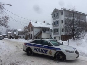 Scene at 223 Desrosiers St. in Vanier Tuesday. JEAN LEVAC / POSTMEDIA