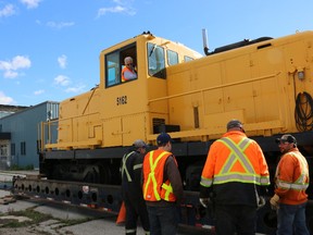 Submitted photo: One of two locomotives that were refurbished in Wallaceburg is loaded for transport to Winnipeg in October. Although it was hoped the refurbished locomotives could've been purchased by a local buyer, with no local operating railway, there was no market for them locally.