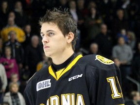 Travis Konecny stands on the Sarnia Sting's blue line during the national anthem prior to an Ontario Hockey League game against the Owen Sound Attack at the Sarnia Sports and Entertainment Centre on Jan. 8, 2016 in Sarnia, Ont. Konecny was picked up in a trade from the Ottawa 67's two days earlier. Terry Bridge/Sarnia Observer/Postmedia Network