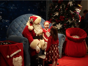 Kids sat with Santa at Billings Bridge mall, and we eavesdropped to hear what they wanted from the jolly old elf. (Bruce Deachman, Postmedi)