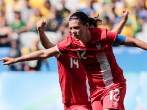 Christine Sinclair of Canada celebrates after scoring against Brazil during the Rio 2016 Olympic Games women's bronze medal football match against Brazil on Aug. 19, 2016. (AFP PHOTO/Miguel SCHINCARIOL)