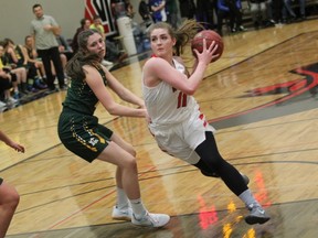 Hailey Weaver, one of at least three Jasper Place Rebels aiming to play CIS basketball next year, shows her abilities in the senior girls’ 79-46 victory over the Lethbridge Clippers in the final of the annual Rebel Invitational tournament. The Ontario-based St. Benedict Saints won the senior boys’ championship over the Kelowna, B.C., Owls. Junior titles were won by Calgary teams: the Bishop O’Byrne Bobcat boys and Western Canada Redhawk girls. (Courtesy Jasper Place high school)