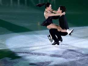 Tessa Virtue and Scott Moir perform during the exhibition gala at the ISU Grand Prix final this month in Marseille, France.  Virtue and Moir, of London and Ilderton, have far exceeded their 18-month plan for a comeback in their sport. (ANNE-CHRISTINE POUJOULAT/Getty Images)