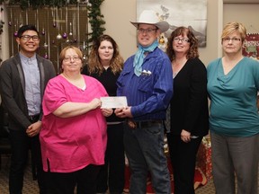 Curtis Anderson donates $1,647 to FOCUS Vermilion on Tuesday, December 13, 2016, in Vermilion, Alta. The donation was raised by the Second Chance Trail Ride earlier this year. Taylor Hermiston/Vermilion Standard/Postmedia Network.