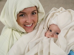 Jennifer Lamarche and her baby, Aila, 7 months, are dressed as Mary and Baby Jesus for the presentation of The Living Nativity on the grounds of Science North in Sudbury, Ont. on Tuesday December 20, 2016. The Living Nativity, which is presented by All Nations Church, can be seen until Dec. 24 at 7:30 p.m. each night. John Lappa/Sudbury Star/Postmedia Network