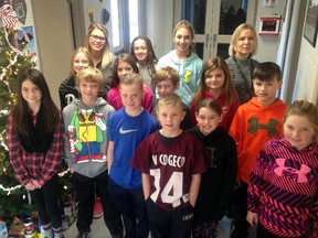Students from Sacred Heart's Me to We group collected toys and canned goods for the local Christmas Hamper campaign.