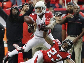 Former Cardinals wide receiver Michael Floyd (15), now with the Patriots, was arrested on suspicion of driving under the influence and other charges earlier this month in Scottsdale, Ariz. (David Goldman/AP Photo)