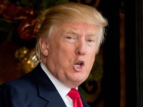 President-elect Donald Trump speaks to members of the media at Mar-a-Lago, in Palm Beach, Fla., Wednesday, Dec. 21, 2016. (AP Photo/Andrew Harnik)