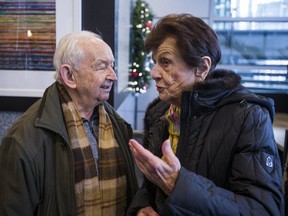Holocaust survivors Howard Chandler and Vera Schiff chat in the lobby of the office of Friends of Simon Wiesenthal Centre for Holocaust Studies in Toronto on Wednesday. (ERNEST DOROSZUK, Toronto Sun)