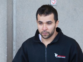 Irvin Alexis Aparicio Chicas, 26, of London leaves the court house after being released on bail conditions for his involvement in the stabbing death of Chad Robinson, in London, Ont. on Wednesday December 21, 2016. Aparicio Chicas will next appear in court on January 16. (CRAIG GLOVER, The London Free Press)