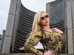Porn star Nikki Benz poses in front of Toronto City Hall. (Postmedia Network file photo)