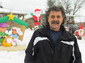 Dario Liegghio won first place in the Celebration of Lights residential lighting competition for the display at his home at 874 Maxwell St., in Sarnia. The awards were announced Wednesday. (Paul Morden, The Observer)