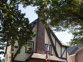 This Tuesday, Oct. 18, 2016 file photo, shows the exterior of a house in the Jamaica Estates neighborhood of the Queens borough of New York, where Republican presidential candidate Donald Trump spent his early childhood. (AP Photo/Mary Altaffer, File)