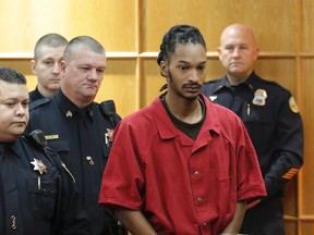 Johnthony Walker, the driver involved in the Nov. 21, 2016 school bus crash that sent 31 of the 37 students on board to the hospital resulting in six fatalities, appears before Judge Lila Statom in Hamilton County General Sessions Court on Thursday, Dec. 15, 2016 for charges of vehicular homicide, reckless endangerment and reckless driving. (Dan Henry/The Chattanooga Times Free Press via AP)