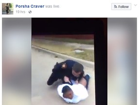 A white Texas police officer is seen in a Facebook video, wrestling a black woman to the ground before arresting her and her two teenage daughters. (Facebook)