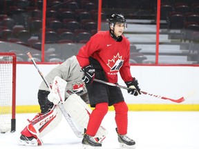 Dylan Strome screens goalie Connor Ingram of Team Canada during practice at Canadian Tire Centre in Ottawa on Dec. 20, 2016. (Jean Levac/Postmedia)