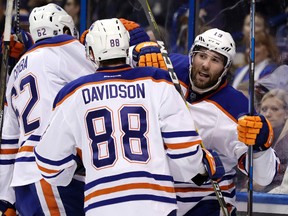 Patrick Maroon, seen here celebrating his goal against the Blues on Monday in St. Louis, says the Oilers' recent success is the result of a team effort. (AP Photo)