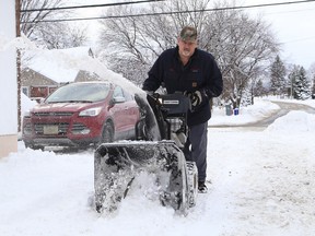 Dave Viau uses a snowblower to clear his driveway in Sudbury. (John Lappa/Sudbury Star file photo)