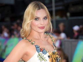 In this Aug. 3, 2016 file photo, actress Margot Robbie poses for photographers upon arrival at the European Premiere of "Suicide Squad," in London. (AP Photo/Joel Ryan)