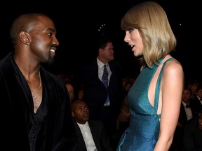 Recording Artists Kanye West and Taylor Swift attend The 57th Annual GRAMMY Awards at the STAPLES Center on February 8, 2015 in Los Angeles, California. West and Swift had one of the biggest celebrity feuds in 2016. (Photo by Larry Busacca/Getty Images for NARAS)