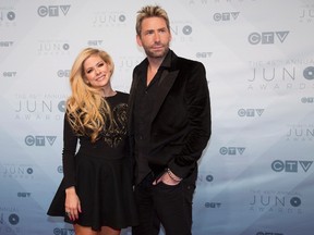 Chad Kroeger and Avril Lavigne arrive on the red carpet at the Juno Awards in Calgary, Sunday, April 3, 2016. THE CANADIAN PRESS/Jeff McIntosh