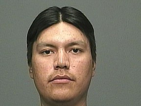 Tyron Custer Harper, 23, should not be approached if seen on the street, said police. (WINNIPEG POLICE SERVICE PHOTO)