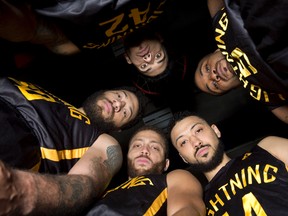 London Lightning starters (clockwise from top) Julian Boyd, Junior Cadougan, Ryan Anderson, Garret Williamson, and Royce White will be hitting the court for their home opener at Budweiser Gardens this Sunday. The teammates are pictured here at a practice at the YMCA Central Branch in London. (CRAIG GLOVER, The London Free Press)