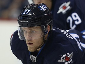 Winnipeg Jets forward Nikolaj Ehlers (bottom) and Patrik Laine. (Kevin King/Winnipeg Sun file photo)