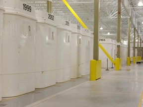 Rows upon rows of dry storage containers, loaded with used fuel rods. These containers, once loaded with the spent fuel bundles weigh about 71 tonnes and are kept inside several buildings on site at the Bruce Nuclear Generating station north of Kincardine. (MIKE HENSEN, The London Free Press)