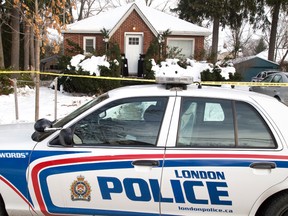 A 35 year old man is dead after a confrontation with police at 56 Duchess Ave. in London. (DEREK RUTTAN, The London Free Press)