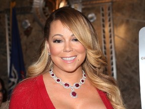 Mariah Carey switches on the Empire State Building’s Christmas lights in New York City on Dec. 6, 2016. (Derrick Salters/WENN.COM)