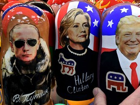 Traditional Russian wooden nesting dolls, Matryoshka dolls, depicting Vladimir Putin, Hillary Clinton and Donald Trump are seen on sale at a gift shop in central Moscow on Nov. 8, 2016. (KIRILL KUDRYAVTSEV/AFP/Getty Images File Photo)