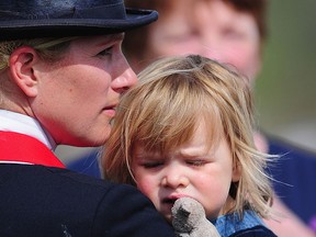 Zara Tindall looks on with daughter Mia during Day Three of the Badminton Horse Trials on May 6, 2016 in Badminton, Gloucestershire. (Harry Trump/Getty Images)