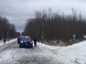 NATHAN TAYLOR/THE PACKET & TIMES
Police taped off the entrance to rail trail at Woodland Drive in Oro-Medonte Township Dec. 24 after an injured person was discovered. Two people were arrested and charged with attempted murder in relation to the incident.