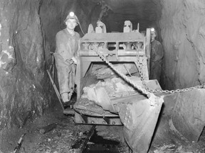 City of Greater Sudbury Archives
Miners using a mucking machine to clear the tracks at Falconbridge Nickel Mines.
Falconbridge Nickel Mines Limited Fonds (image 002-1-1-2).