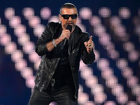 George Michael performs at the Olympic stadium during the closing ceremony of the 2012 London Olympic Games in London on Aug. 12, 2012.  (JEWEL SAMAD/AFP/GettyImages)