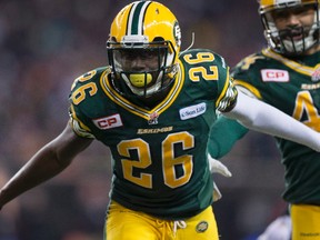 Edmonton Eskimos' John Ojo celebrates stopping a kick return during the second half of the 103rd Grey Cup in Winnipeg, Man. Sunday, Nov. 29, 2015.